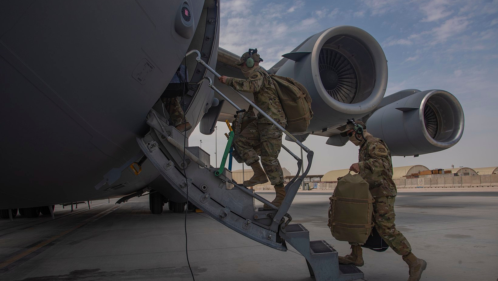 On August 30, 2021, the United States concluded a two-decade-long war in Afghanistan that had persisted since 2001. The US withdrawal, first declared in 2014, has gone through different stages with up to 3 successive administrations until reaching the final US-Taliban Doha agreement in 2020. How did the US withdrawal unfold? And what transpired over the span from the first declaration in 2014 until the take-off of the last military aircraft in 2021? 2014: Obama Declares withdrawal In 2014, the US President Barack Obama announced that the US would withdraw from Afghanistan by the end of the year, marking the end of Operation Enduring Freedom, the official name adopted by the US government for the war in Afghanistan. Although a significant number of the US troops did indeed depart Afghanistan by 2014 along with the NATO’s International Security Assistance Force (ISAF), a contingent of 9,800 US troops remained deployed in Afghanistan as part of the Operation Freedom's Sentinel (OFS) within the broader NATO’s Resolute Support Mission (RSM). The US contingent was seen as vital to train and assist the new Afghan troops in counter-terrorism missions. Thus, General John F. Campbell, commander of RSM, requested an additional 1,000 US troops. 2017: US strategy shifts under Trump Under Donald Trump, the United States strategy in Afghanistan kept the course of boosting special operations forces to bolster Afghan troops capabilities to dismantle the Taliban. In addition, the air forces and artillery capabilities were improved along with a steadfast commitment to maintain the standing government in Kabul. In July 2017, President Donald Trump made a military decision to increase the number of US forces in Syria, Iraq, and Afghanistan surpassing the congressional say. Trump's Afghanistan strategy was unveiled one month later with clear aims: obliterating ISIL, crushing Al-Qaeda, and preventing the Taliban from taking over the country. Additional troops were accordingly deployed in Afghanistan bringing the total to a hit of 14,000 in September 2017. However, two years later, US military and government officials were reportedly believing the war in Afghanistan was unwinnable. Meanwhile, an abrupt decision was made to reduce the troops in Afghanistan as part of the US National Defense Strategy to shift the focus from counterterrorism to confront Russian and Chinese power projection. 2020: The US-Taliban deal in Doha In February 2020, the US diplomatic envoy, Zalmay Khalilzad, and the Taliban signed the Agreement for Bringing Peace to Afghanistan that provided a 14-month time frame for a US full withdrawal from Afghanistan. The Doha-brokered deal was notably concluded without participation from the Afghan official government. Committing to the deal, the United States reduced its military expedition in Afghanistan from 13,000 troops to approximately 8,600, with an expressed intention to further decrease this number providing that Taliban uphold the terms of the deal by preventing al-Qaeda or any other extremist group from operating inside Afghanistan. By January 2021, the troop count had gone down to 2,500 troops, the least number of US troops in Afghanistan since 2001. On the other hand, the intra-Afghan peace talks failed to go after Afghan President Ashraf Ghani, excluded from the deal, refused to comply with the deal’s call for a prisoner exchange. The Taliban requested the government to free 5,000 prisoners, while Ghani stated that the prisoner exchange cannot be a prerequisite but must be a part of the negotiations. Post-Agreement Dynamics: Taliban offensive and abrupt US withdrawal After the deal, the United States suspended its support to the Afghan military’s offensive operations, compelling a shift to predominantly defensive positions nationwide. As per the terms of the agreement, US military airforce refrained from attacking the Taliban troops located 500-meter away from the US troops, thereby granting the Taliban the prerogative to target Afghan military units. From March 1 to April 15, 2020, within 45 days of the agreement, the Taliban waged over 4,500 attacks inside Afghanistan, 70% higher than the number of the attacks in the same period of 2019, killing more than 900 Afghan troops, up from about 520 in the same period during the previous year. At the same time, due to a clear decline in the number of attacks and air raids by Afghan and US forces against Taliban, the Taliban casualties fell to 610 from about 1,660 in the same period of the previous year. The Pentagon spokesman, Jonathan Hoffman, stated that while the Taliban have ceased its attacks against the US-led coalition forces in Afghanistan, the violence was still unacceptably high, stalling the path to a diplomatic resolution, remarking, “We have continued to do defensive attacks to help defend our partners in the area and we will continue to do that.” 2021: Biden Administration resumes withdrawal In January 2021, Joe Binden’s National Security Advisor Jake Sullivan said the US would review the peace agreement to fully withdraw the remaining US troops from Afghanistan. Initially planned for completion by May 2021, the withdrawal timeline was subsequently extended to September 2021. President Biden confirmed this decision in April 2021, expressing the decision to conclude the withdrawal by the 20th anniversary of September 11 attacks. The process culminated in the withdrawal of all US troops from Afghanistan in August 2021. Although it was estimated that there would be a significant security threat after the withdrawal, the decision was made with the aim of refocusing efforts on other challenges such as China and the Covid-19 pandemic. Following the withdrawal, the options of redeploying US troops to the region were reviewed. This decision was born from a 20-year late understanding that Afghanistan cannot be transformed into a modern democracy with the presence of the US military. May-August 2021: The final chapters On May 1, 2021, the initially designated deadline for withdrawal, the Taliban launched a major offensive, swiftly advancing against the retreating US-trained Afghan corps and capturing Afghan cities one after another. On July 2, Germany and Italy pulled out their troops from Afghanistan, and the US forces evacuated Bagram Airport, the heart of the US military deployment in Afghanistan. Afghan officials complained that the Americans left without notifying the new Afghan commander, who was informed more than two hours after the US troops left the base. As a result, the base was ransacked by looters, before the Afghan authorities were able to take control of the airport. Fighting raged between Taliban and the Afghan government forces, with Al Jazeera analysts saying that the Taliban were "at Kabul's doorstep." On July 8, 2022, President Biden declared that the formal end of the war in Afghanistan would be on August 31, 2021. Biden justified the withdrawal by expressing confidence in the capability, training, and competence of the Afghan forces to manage the country. However, it became evident that the Afghan military would be crushed before the Taliban's rapid advancement within a matter of weeks. By July 12, the Taliban had succeeded in capturing 139 districts from the Afghan National Army. A US intel report predicted the Afghan government would collapse within six months of the withdrawal, but the US military later revised this assessment, pointing out the collapse would occur much sooner. In parallel, Austin S. Miller resigned as the commander of US and NATO forces in Afghanistan, and the Taliban spokespersons, including Suhail Shaheen and Mohamed Naeem, issued statements asserting the imperative for the withdrawal of all foreign forces from Afghanistan. The movement explicitly refused to engage in any negotiations until the complete withdrawal of foreign forces from the country. On July 21, Chairman of the Joint Chiefs of Staff Mark Milley conveyed that approximately half of the regions in Afghanistan were under the control of Taliban. A climax was reached on August 15 by the fall of the Afghan capital, Kabul, into Taliban’s hands without any resistance. This pivotal moment witnessed the Afghan president fleeing the country, and the Taliban swiftly stepping into the presidential palace, taking over the seat of power. The US kept approximately 650 American soldiers in Afghanistan tasked with safeguarding Kabul Airport and the American Embassy. Following the fall of Kabul, additional troops were deployed to facilitate evacuation efforts. On August 30, American military aircraft departed from Kabul Airport, marking the end of the American military presence in Afghanistan after two decades of war.